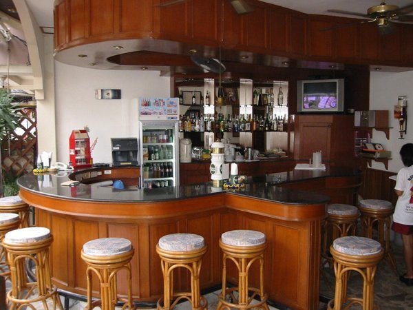 Bar counter and stools at Hotel Orchid Residence