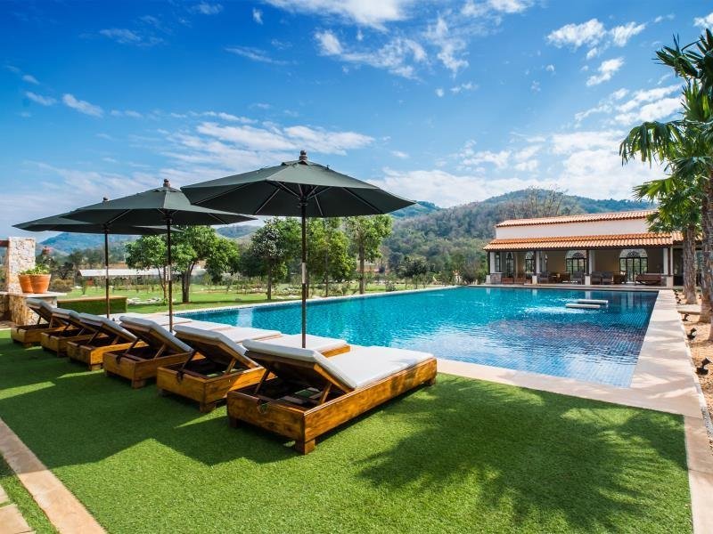 Swimming pool and deck at Mela Garden