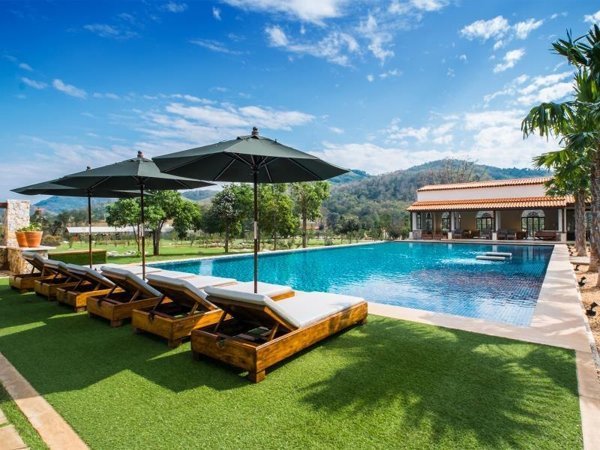 Swimming pool and deck at Mela Garden