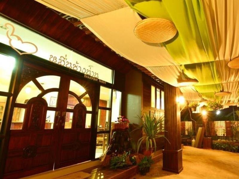 Covered wooden entrance at Muen Chang Nan Boutique Hotel