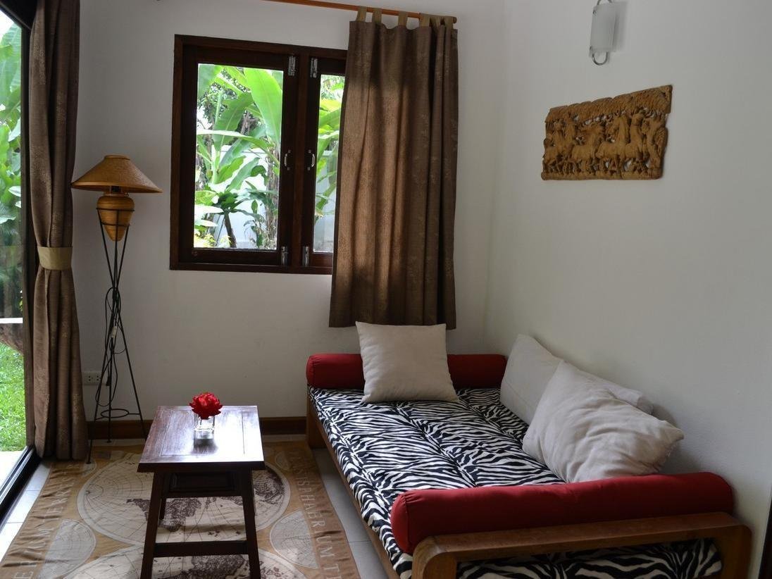Guest-room sleeping and sitting area at Nova Maetaeng Guest House