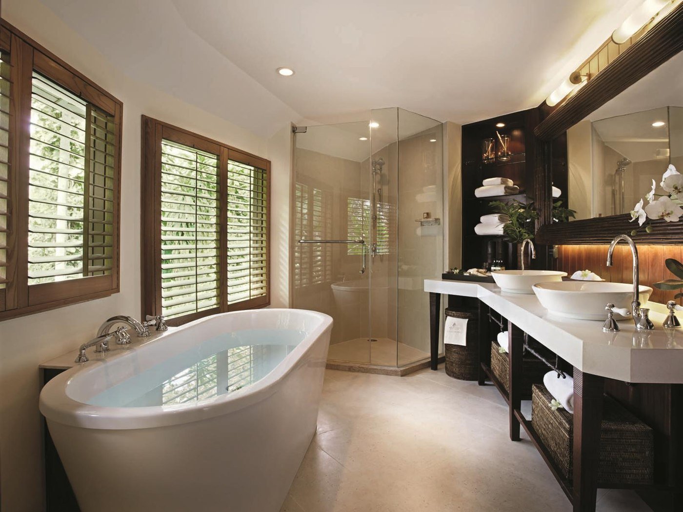 Bathroom with freestanding bathtub and double vanity at Rayavadee