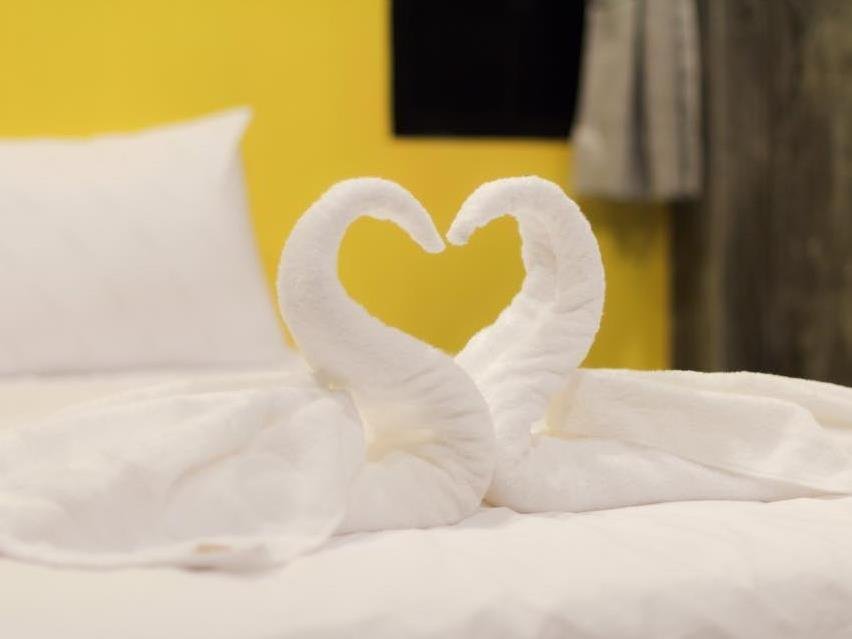 Towel swans on a Riad Resort bed