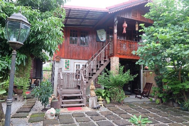 Timber house and garden stairs at The Guesthouse Chiangmai