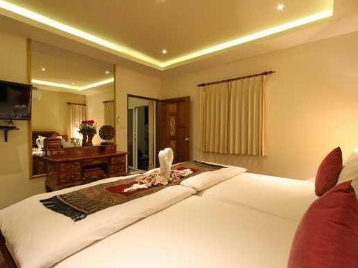 Twin bedroom at The Siam Residence Boutique Resort