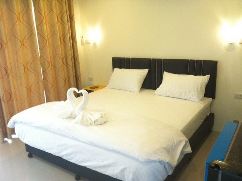 Double-bed room at U-Dee Hotel